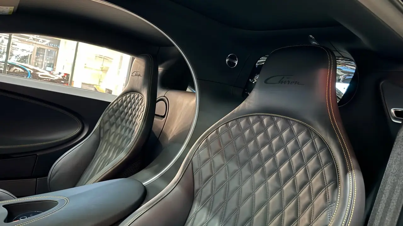 Bugatti Chiron 110 Ani 2019, dashboard — Cannes Luxury Car Rental, Cannes. Bugatti Chiron 110 Ani in Cannes Hiring a Bugatti Chiron 110 Ani in Cannes provides an…
