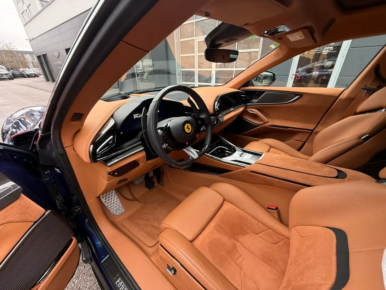 Ferrari Purosangue 2024, rear view — Cannes Luxury Car Rental, Cannes. Ferrari Purosangue in Cannes Hiring a Ferrari Purosangue in Cannes provides a…